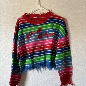 Colorful Striped Sweater with Distressed Details